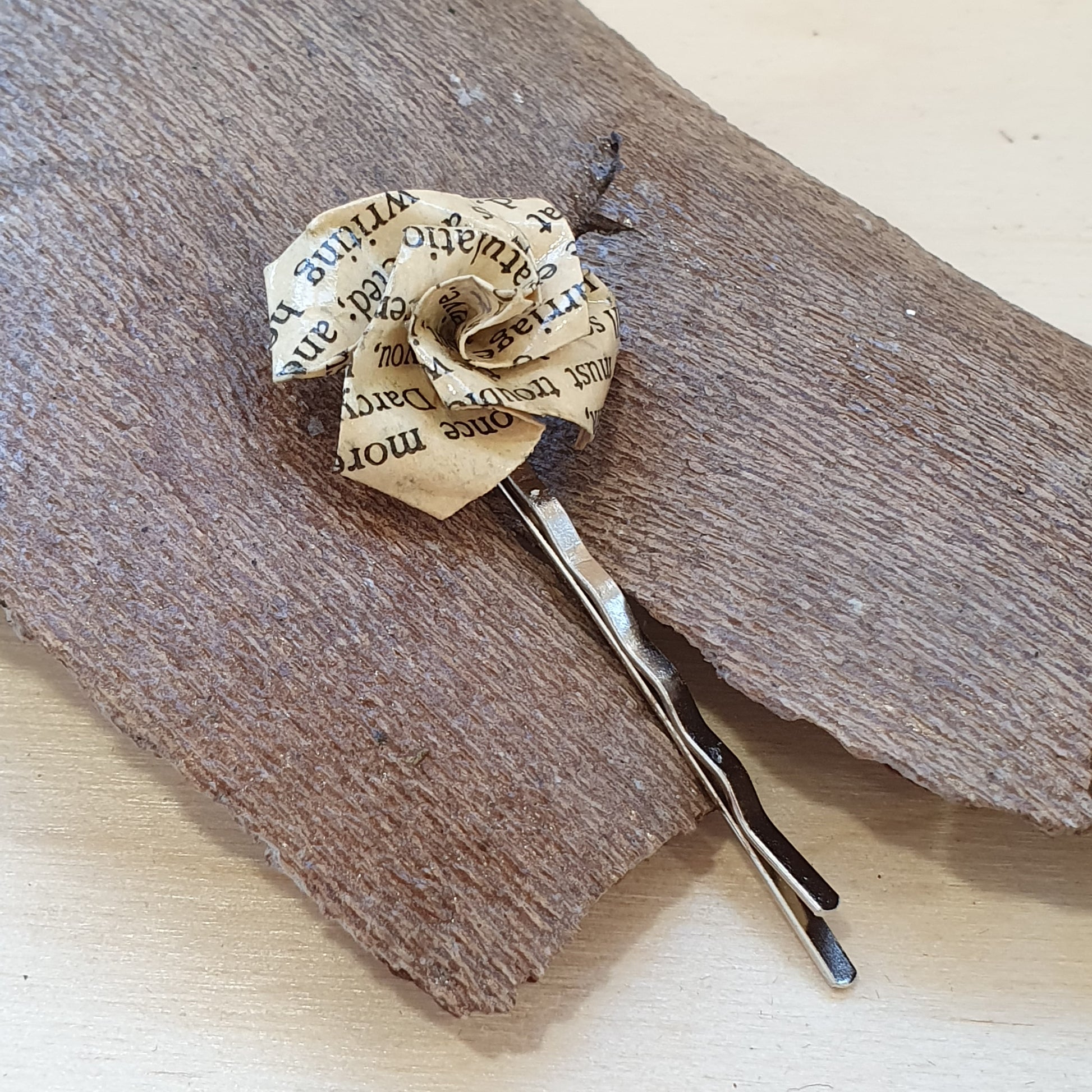 Origami rose hair grip made with paper from an old copy of Pride and Prejudice image 0