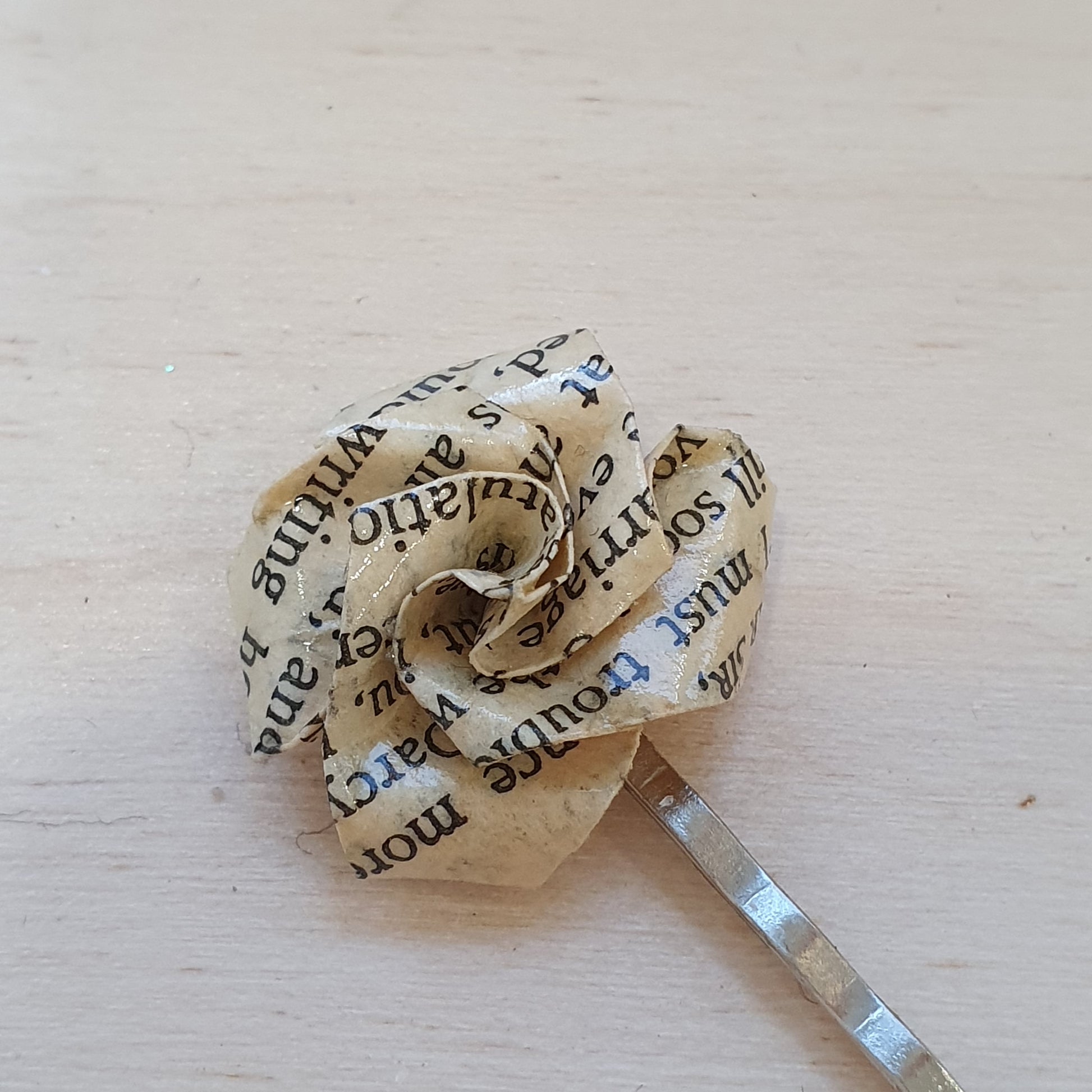 Origami rose hair grip made with paper from an old copy of Pride and Prejudice image 2